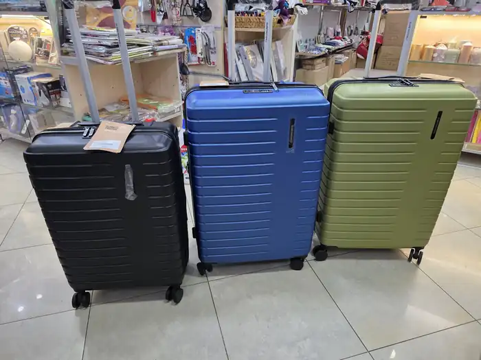 Black, blue and green Globetrotter hard-shell suitcases in the Stara Zagora shop