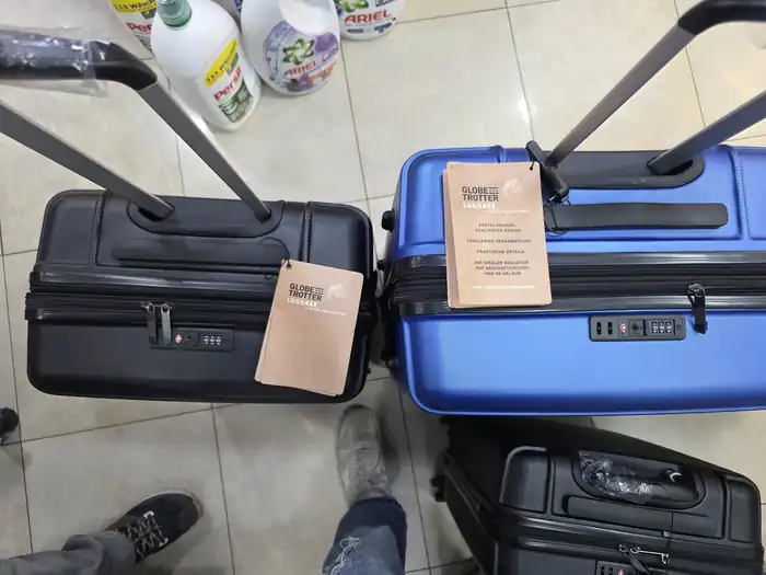 Globetrotter suitcases from above with telescopic handle and TSA combination lock